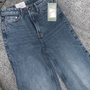 Medium Wash Relaxed Fit Jeans with Vintage Fading